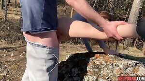 Young couple in the countryside shoot their sex on video camera