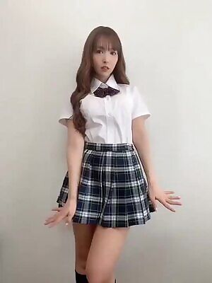 Yua Mikami waving at the camera