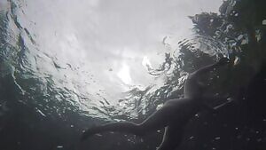 Kat Malone skinny dipping in the Smith River by Me. 2019.