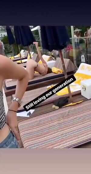 Woman taking a selfie of her ass in public.