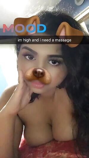 Who trying to massage her tits
