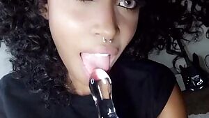 Biracial hottie with BEAUTIFUL eyes sucks on her butt plug
