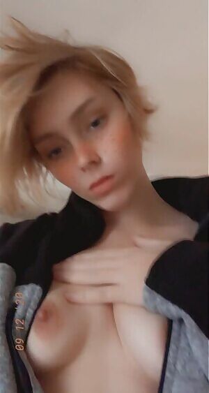 Nerdy barista with a pixie cut