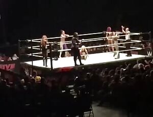 Alexa fails a kip up while Mickie taunts her